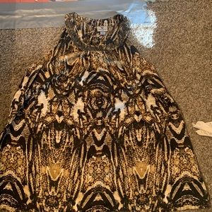 This is a blouse tank top it is a snake skin print.